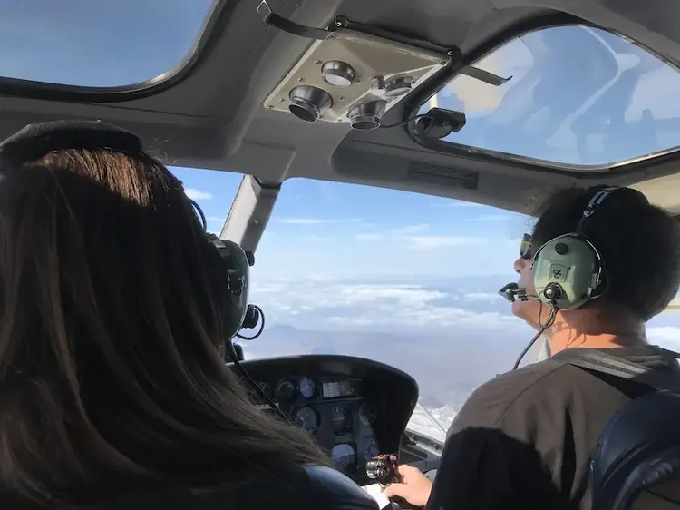 Helicopter in flight over Etna