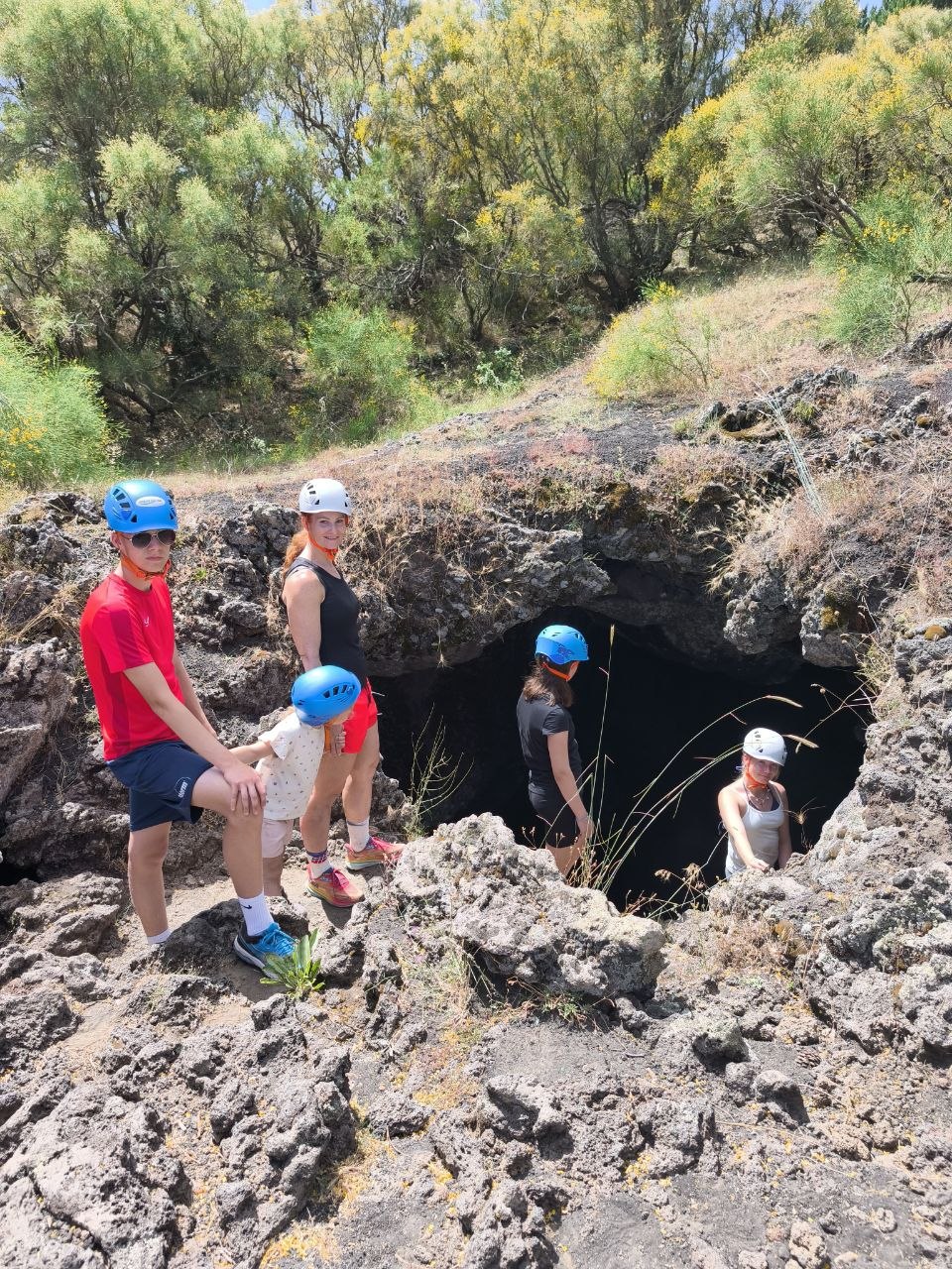 Explorers inside the lava cave